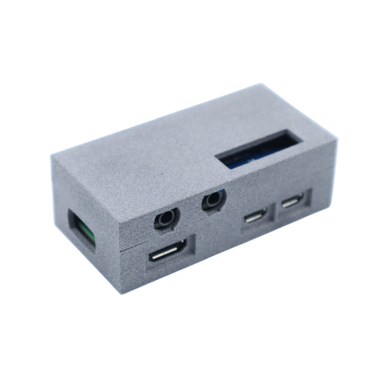 Gray electronic Raspberry PI module with ports on a white background